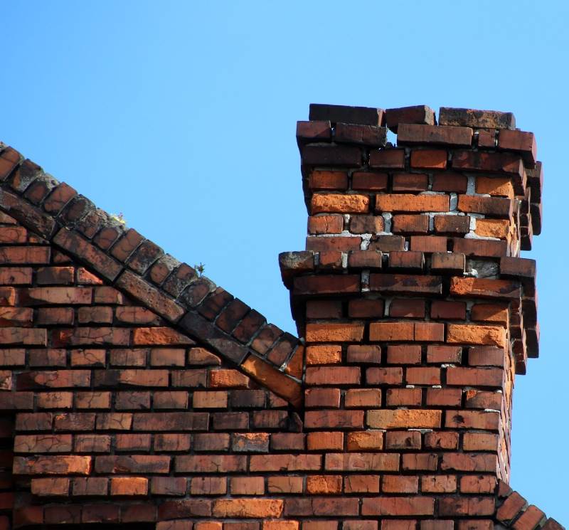 Signs Your Broadview Home Needs a Chimney Inspection Damaged chimney on an Broadview home showing cracks and missing mortar
